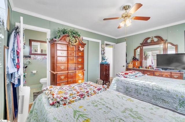 bedroom with ceiling fan, ornamental molding, a closet, and ensuite bath