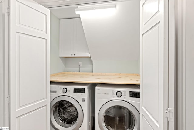 laundry area featuring washing machine and dryer