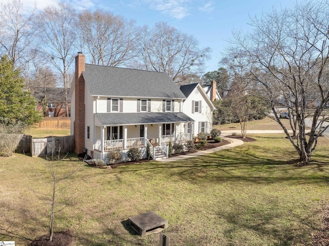 view of front of house featuring a front yard and a porch