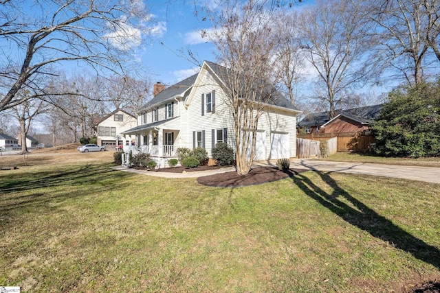 view of front of house with a porch and a front yard