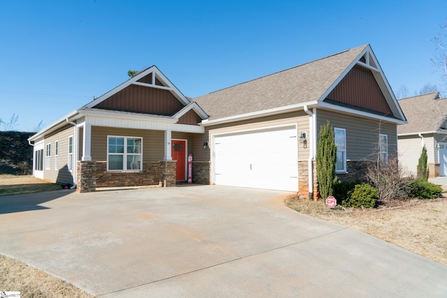 craftsman house with a garage