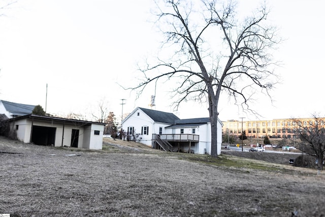 rear view of property with a deck