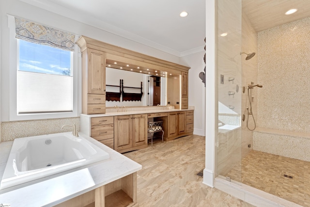 bathroom featuring vanity, crown molding, and separate shower and tub