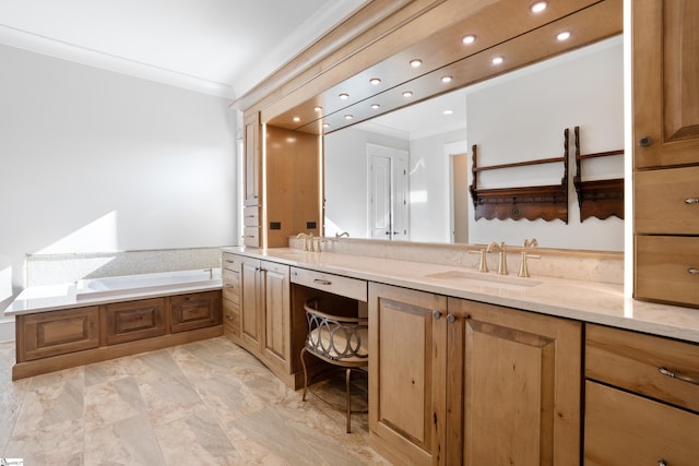 bathroom featuring vanity, a bathtub, and ornamental molding