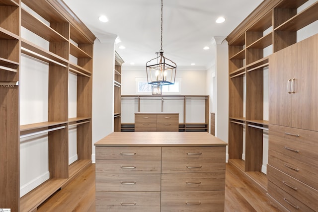 walk in closet featuring light wood-type flooring