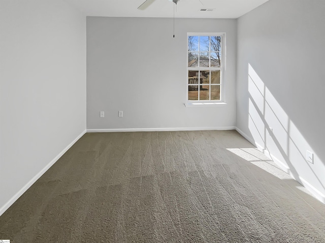 carpeted empty room with ceiling fan