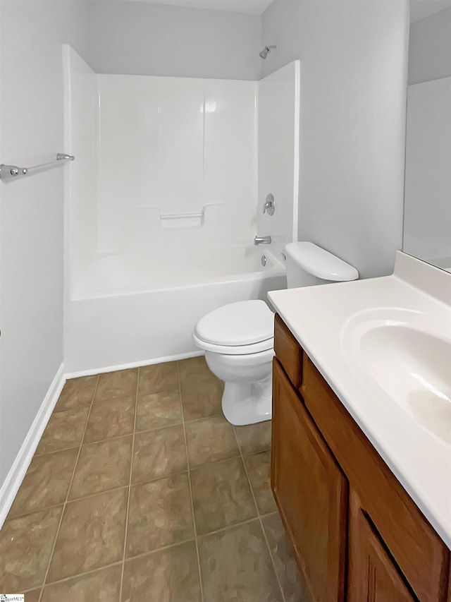 full bathroom featuring vanity, tile patterned floors, toilet, and bathtub / shower combination