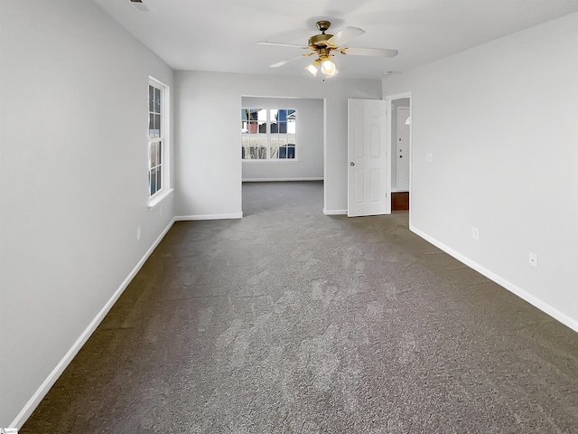 unfurnished room with ceiling fan