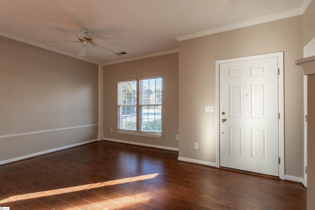 entrance foyer with ornamental molding, ceiling fan, and dark hardwood / wood-style flooring