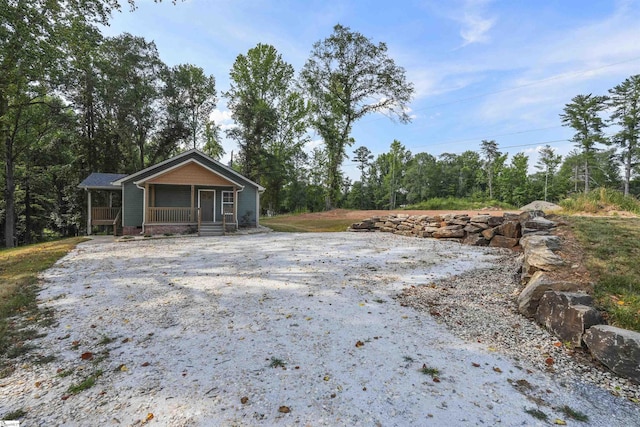 exterior space featuring covered porch