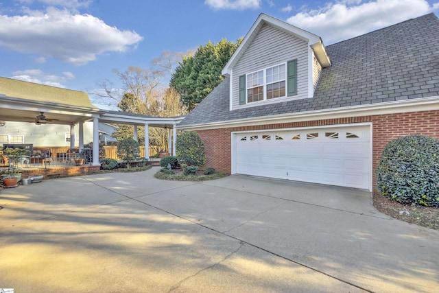 view of side of home featuring a garage