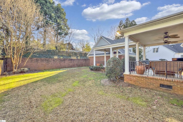 view of yard featuring ceiling fan