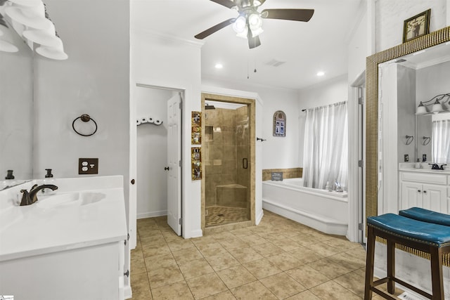 bathroom with crown molding, shower with separate bathtub, and tile patterned flooring