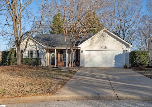 ranch-style house featuring a garage