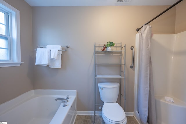 bathroom with a bathtub and toilet