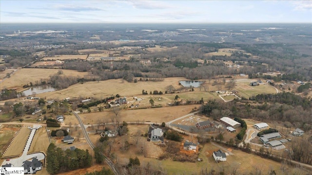 bird's eye view featuring a rural view and a water view