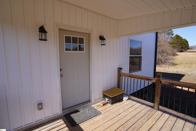 entrance to property with a wooden deck