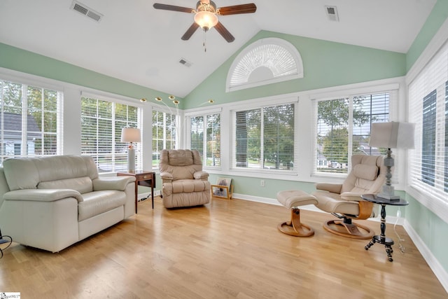 sunroom with vaulted ceiling and ceiling fan