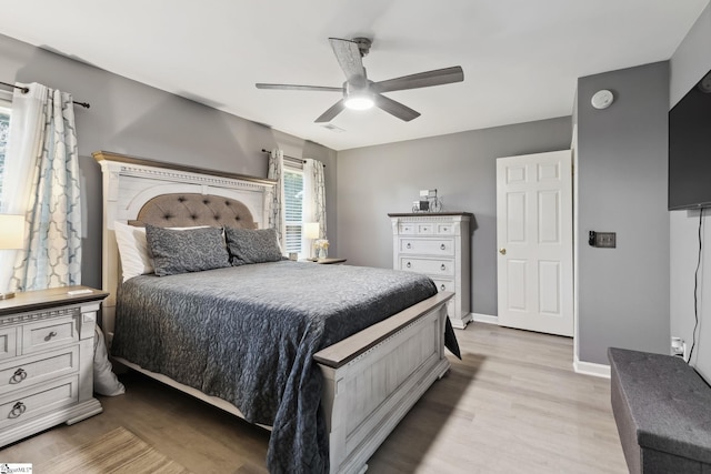 bedroom featuring ceiling fan and light wood-type flooring