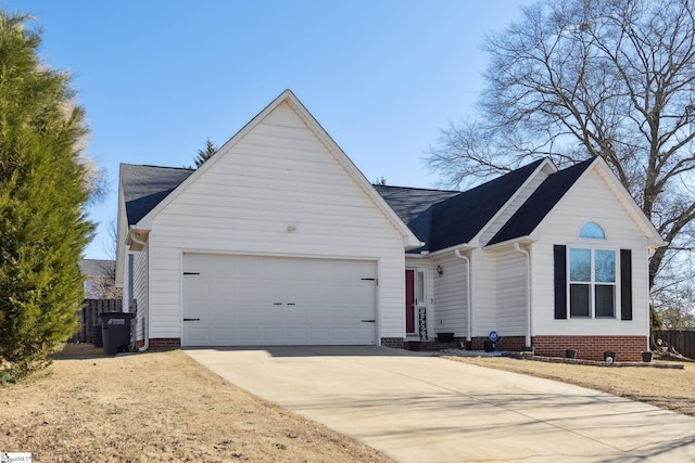 ranch-style home featuring a garage