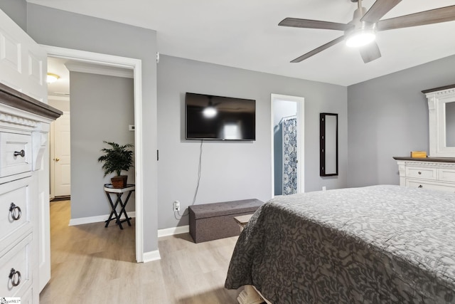 bedroom featuring light wood-type flooring and ceiling fan