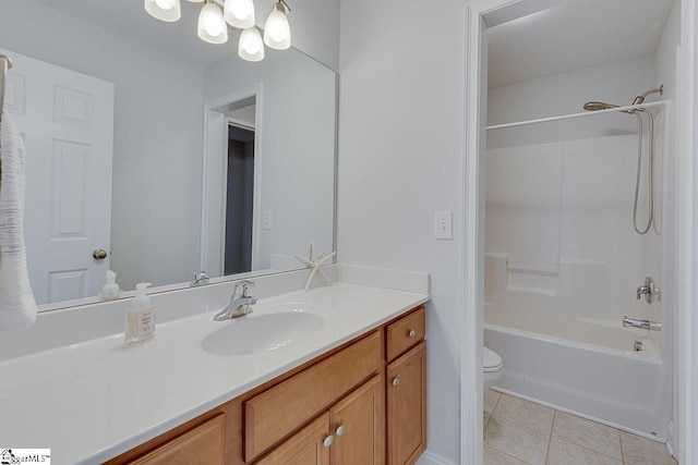 full bathroom featuring bathtub / shower combination, tile patterned floors, toilet, and vanity