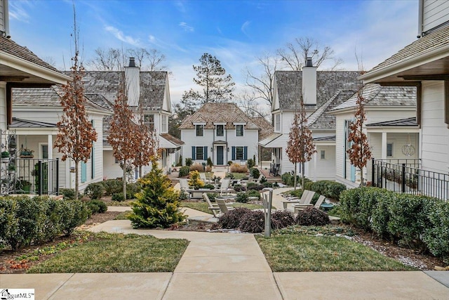 surrounding community featuring a patio