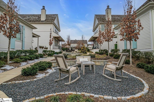 view of patio / terrace with an outdoor fire pit