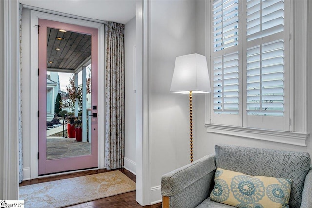 entryway with hardwood / wood-style flooring