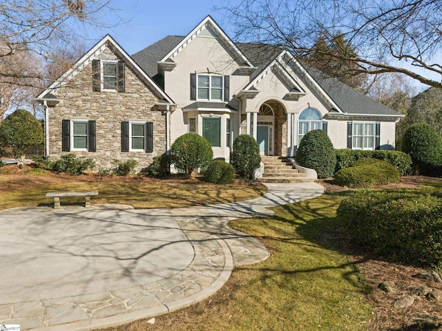 view of front of home with a front lawn