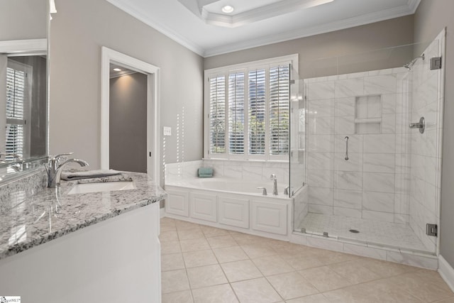 bathroom with vanity, ornamental molding, tile patterned floors, and shower with separate bathtub