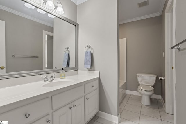 bathroom with tile patterned flooring, crown molding, vanity, and toilet