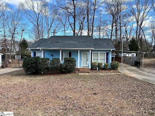 ranch-style house with a carport