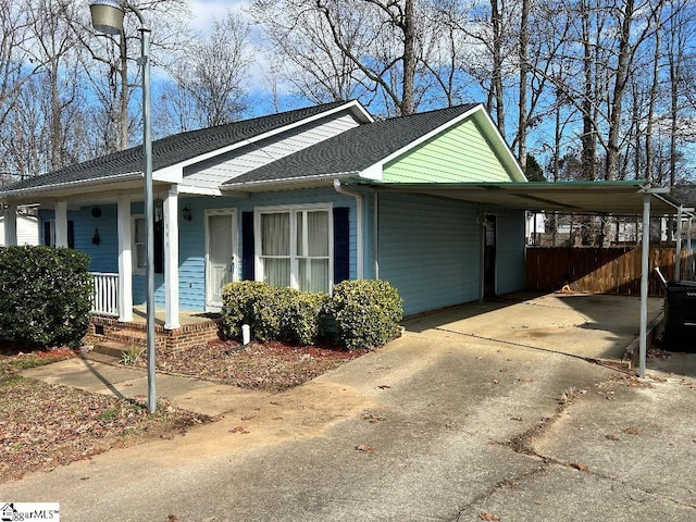 view of front of property with a carport