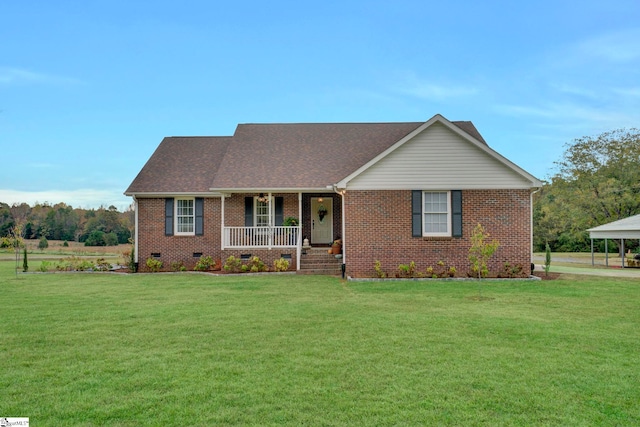 ranch-style house featuring a carport, covered porch, and a front yard