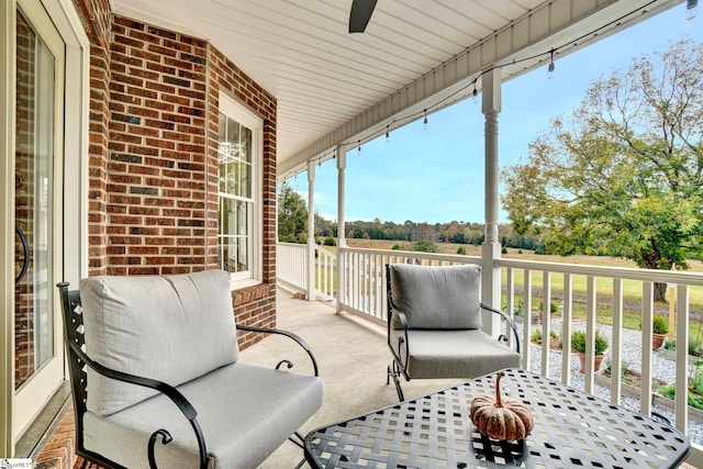 exterior space with ceiling fan