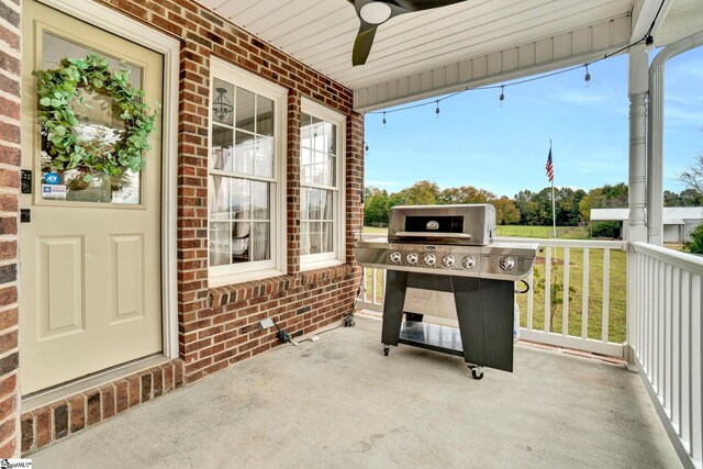 view of patio / terrace featuring ceiling fan, a porch, and area for grilling