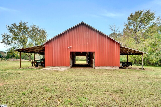 view of outdoor structure with a yard