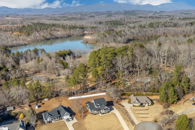 aerial view featuring a water and mountain view