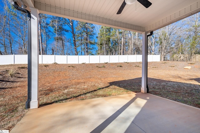 view of yard featuring a patio and ceiling fan