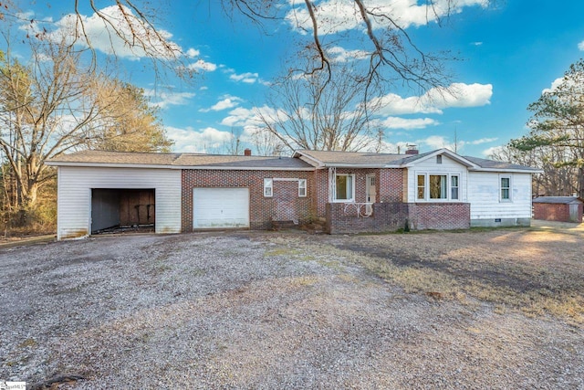 ranch-style house with a garage