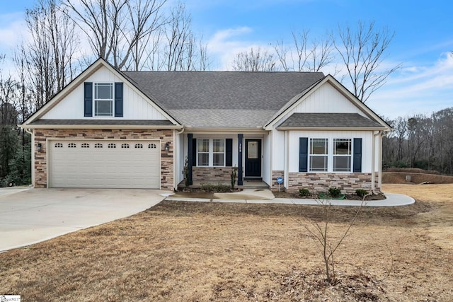 craftsman-style home featuring a garage and a front lawn