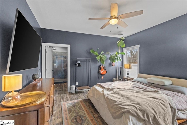 bedroom with ceiling fan and dark hardwood / wood-style flooring