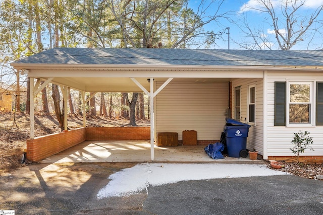 view of patio featuring a carport