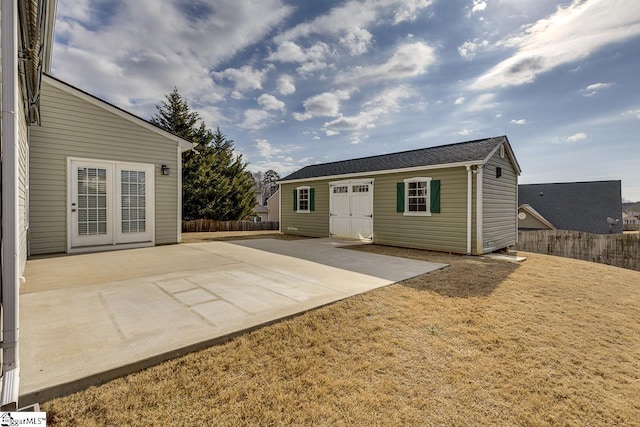 exterior space with an outbuilding and a patio