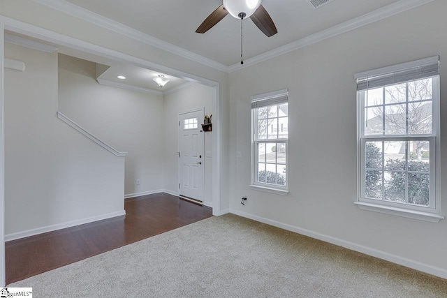 entrance foyer with crown molding, ceiling fan, and dark hardwood / wood-style flooring