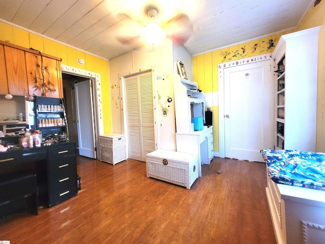 kitchen with dark hardwood / wood-style flooring and ceiling fan