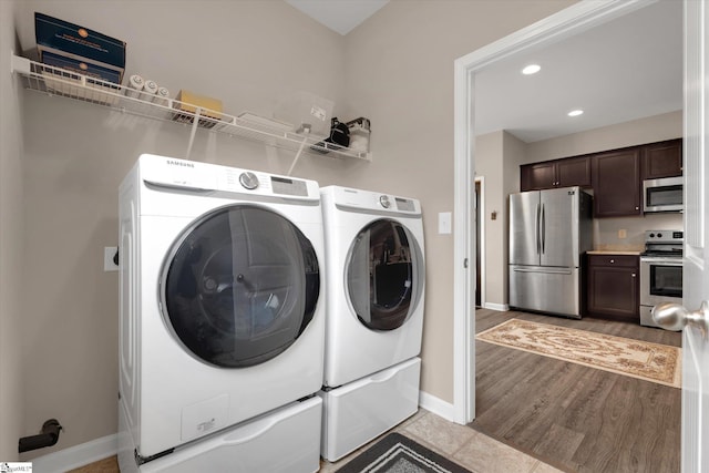 laundry room featuring washing machine and dryer