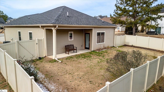 back of property with a patio area