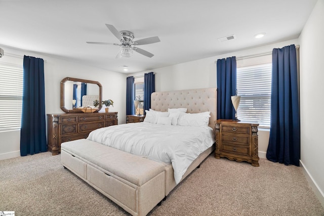 carpeted bedroom featuring ceiling fan